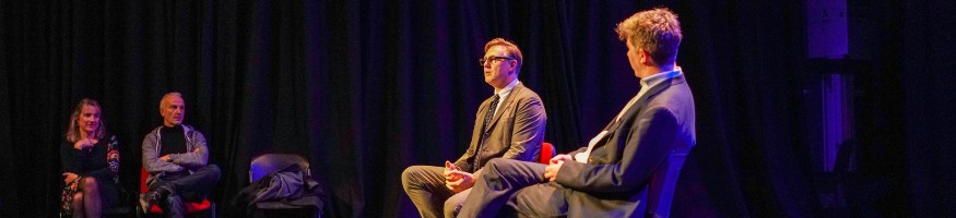 David Morrissey address students in a theatre at Liverpool Hope University's Creative Campus.